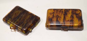 Two vintage composition vanity sets in the form of cigar cases (2)