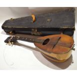 Vintage mandolin in case, 56cm long