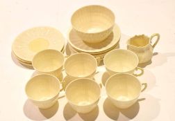 Group of Belleek tea wares with shell moulded decoration, jug with brown mark, most other pieces