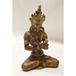 Oriental bronzed effect of Buddha Shakayamuni in classic pose, 20cm high