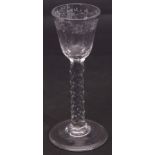 18th century wine glass, the funnel bowl with engraved floral design above a faceted stem (chip to