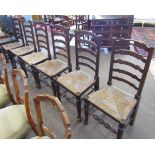 Set of six Lancashire style oak ladder back dining chairs with cord seats, turned legs and