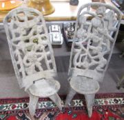 Pair of African hardwood tribal chairs with figure carved backs