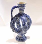 Unusual German stoneware jug, the body split into four loop handles, 42cm high