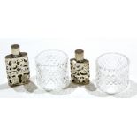 Two white metal mounted and glass scent bottles and two glass napkin rings (4)