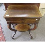 Late Georgian rosewood work table, the hinged lid opening to reveal a mirror under and sectional