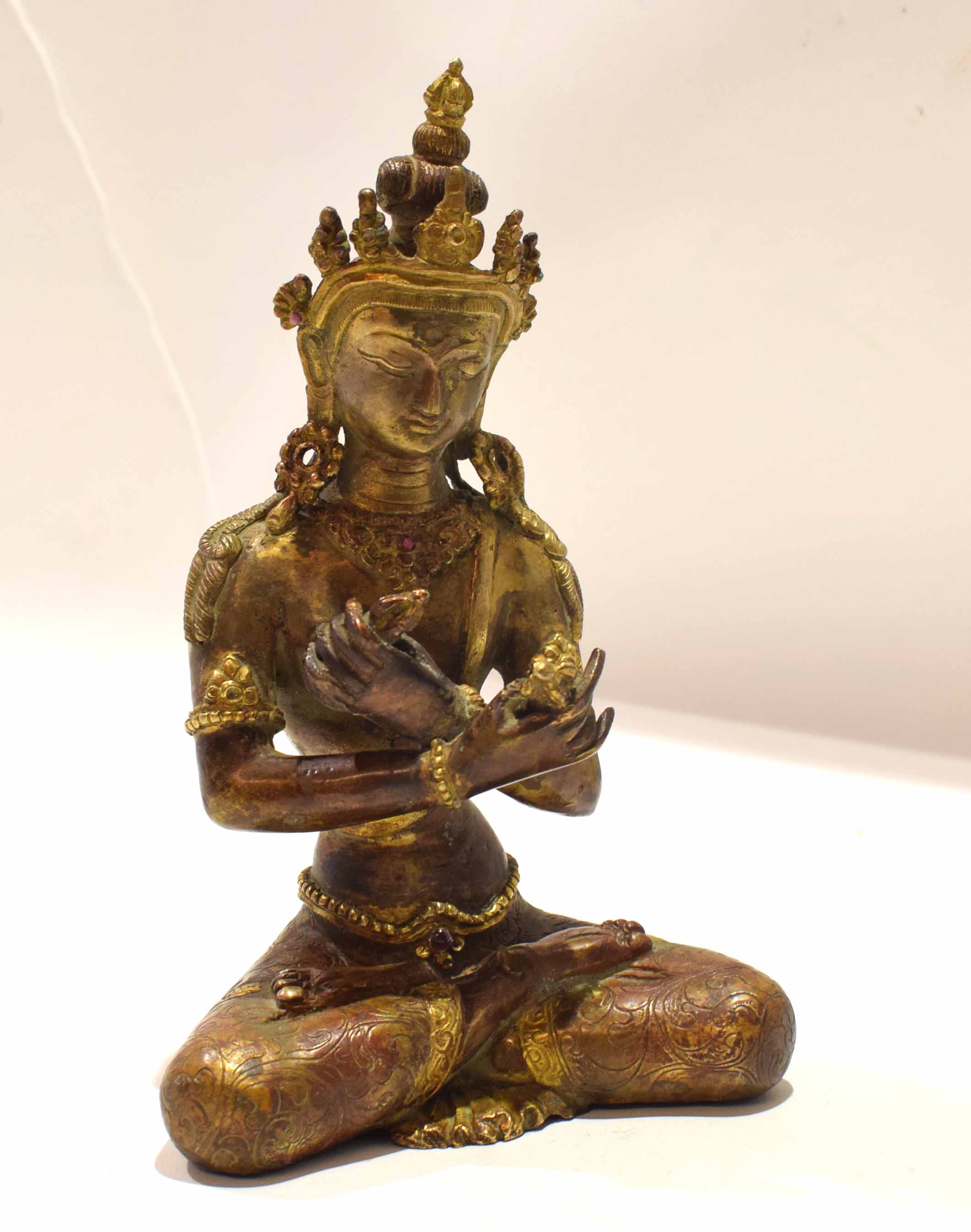 Oriental bronzed effect of Buddha Shakayamuni in classic pose, 20cm high - Image 2 of 4