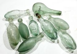 Box containing a collection of vintage glass lemonade and other bottles, some of local interest