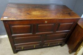18th century oak blanket box with planked top and panelled front, 123cm wide