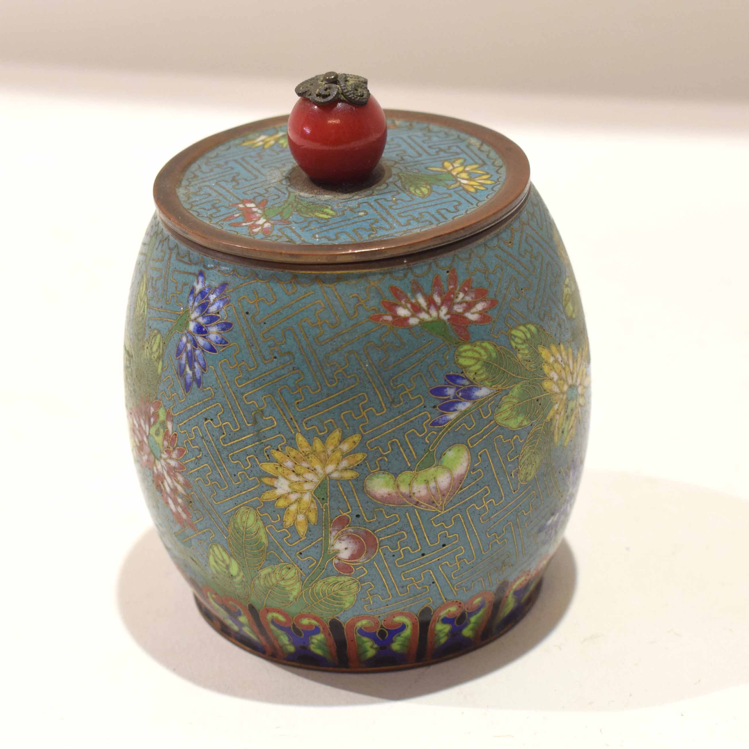 Cloisonne bowl and cover with decoration of flowers, the cover with a tomato or cherry knop, 9cm