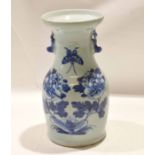 Chinese porcelain vase decorated in provincial style with rock work and flowers, with two lug