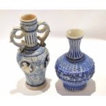 German salt glaze stoneware vase with a basket weave design in blue, together with a Westerwald type