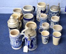 Collection of German Westerwald type stoneware tankards, most with German mottos and typical