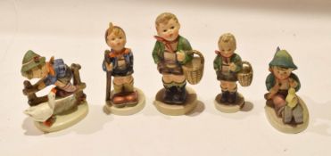 Group of Goebel figures modelled by Hummel, two of the village boy and other children figures