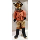 Large modern doll in the form of a fox wearing hunting pink and riding boots, 81cm high