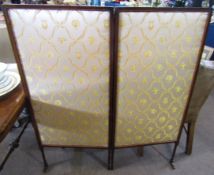 Early 20th century mahogany framed two-fold brass screen upholstered in silk fabric, decorated