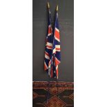 Two Union Jack flags, gilded pointers and dark blue stems, 157cm long