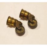 Two 19th century brass casters, stamped "Howard & Son"