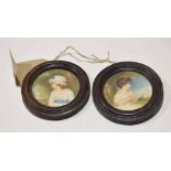 Pair of circular coloured prints of Victorian children