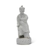 Chinese porcelain white glazed figure of an immortal, probably Li Teaquai, in typical pose, the