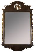 Walnut and mahogany parcel gilded Chippendale style large wall mirror, the shaped top crested with