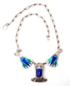 Vintage Egyptian revival white metal and enamel scarab necklace, the triangular enamel scarab