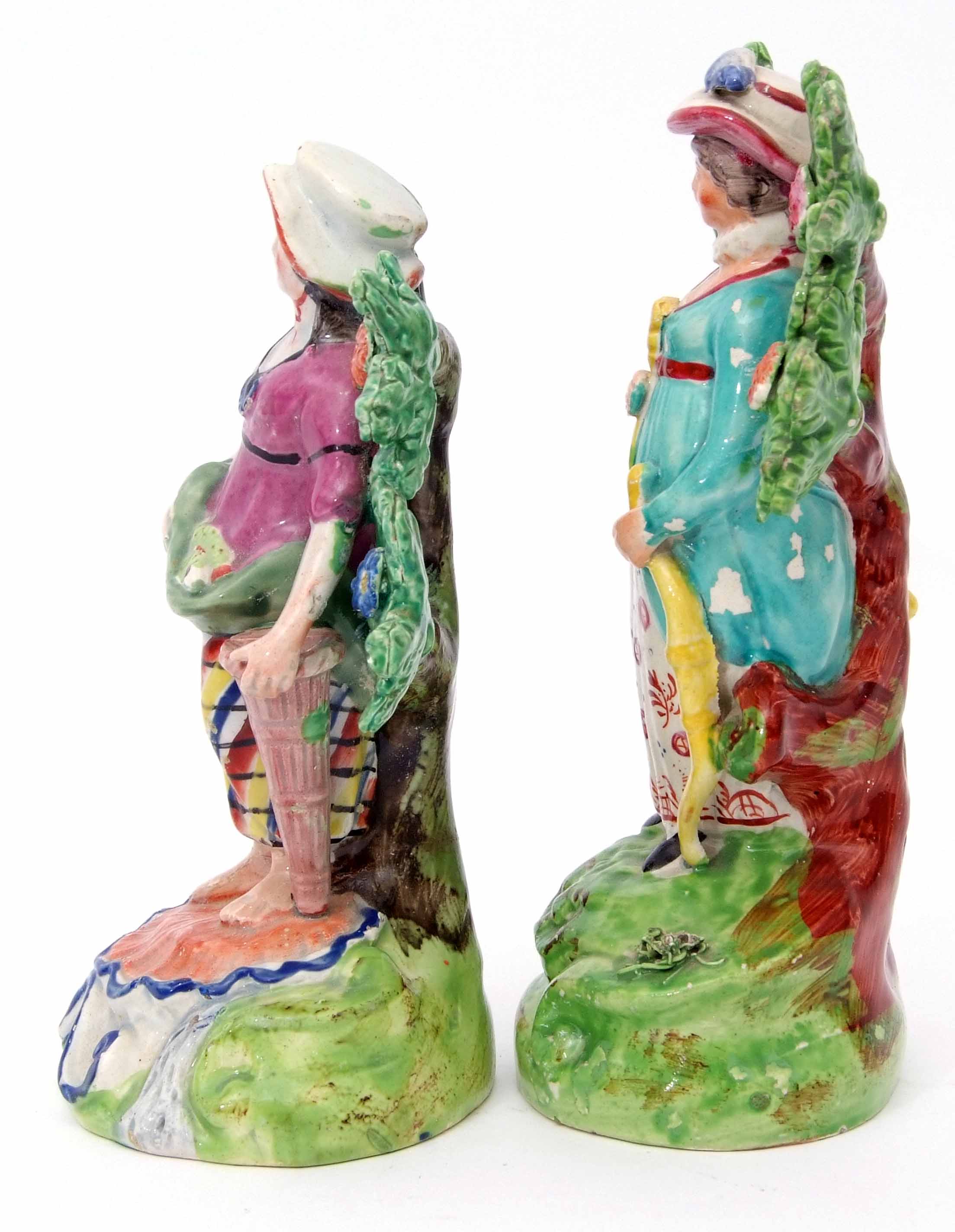 Two Walton type Staffordshire figures, circa 1840, standing against bocage, one of a fish seller, - Image 2 of 5