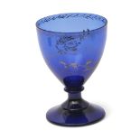 Absolon decorated blue glass rummer, ovoid bowl with gilt decoration to the front "A present from