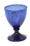Absolon decorated blue glass rummer, ovoid bowl with gilt decoration to the front "A present from
