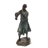 Franz Xaver Bergmann, signed in monogram, cold painted bronze study of a slave girl blowing a