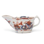 Small Lowestoft porcelain sauce boat, decorated in underglaze blue with the two porter landscape