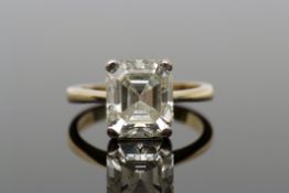 Diamond single stone ring, the emerald cut diamond weighing 4.33ct, the stone set in 18ct yellow and