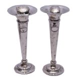 Tall pair of George V trumpet flower vases on plain circular loaded bases with spot hammered