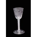 Mid-18th century wine glass, the large rounded funnel bowl above a double series opaque twist