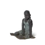 Good quality bronze model of a seated girl with multiple patina, with legs to one side and cupped