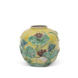 Chinese pottery jar, the yellow ground decorated in relief with lotus and a crane, in polychrome