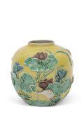 Chinese pottery jar, the yellow ground decorated in relief with lotus and a crane, in polychrome