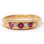 18ct gold ruby and diamond ring, alternate set with three graduated circular cut rubies and two