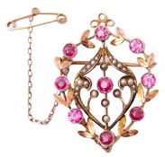 Antique natural seed pearl and pink stone openwork brooch stamped 9ct, 4 x 3cm