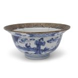 Chinese 18th century blue and white bowl with metal rim, painted with Chinese figures in garden