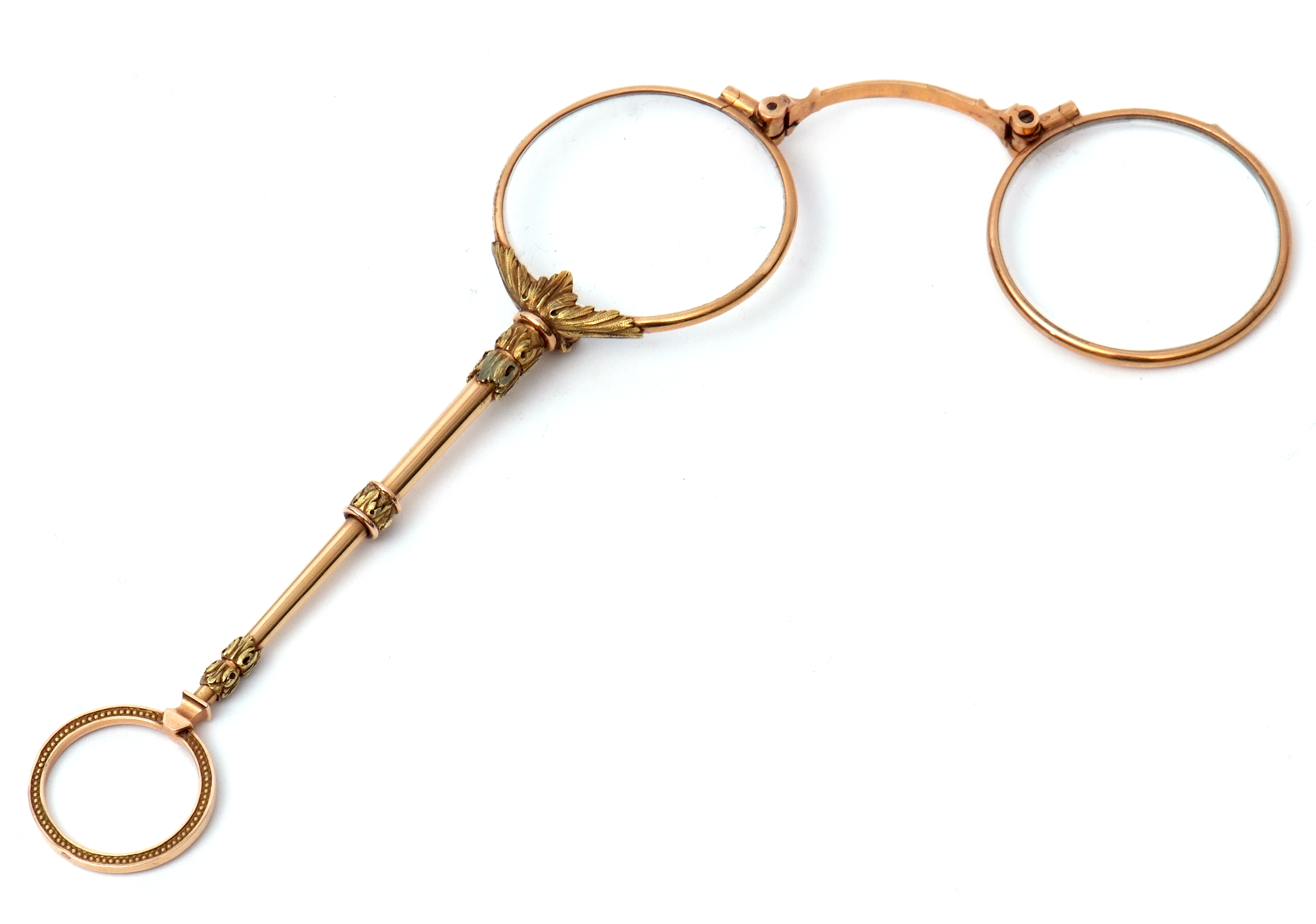 Pair of late 19th century French gold lorgnettes, the frames and ring turned handle marked with