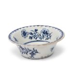 Lowestoft patti-pan with floral design within a berry border, the interior decorated with a