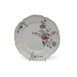 18th century Strasbourg faience plate decorated with floral sprays in fleur des Indes style, the