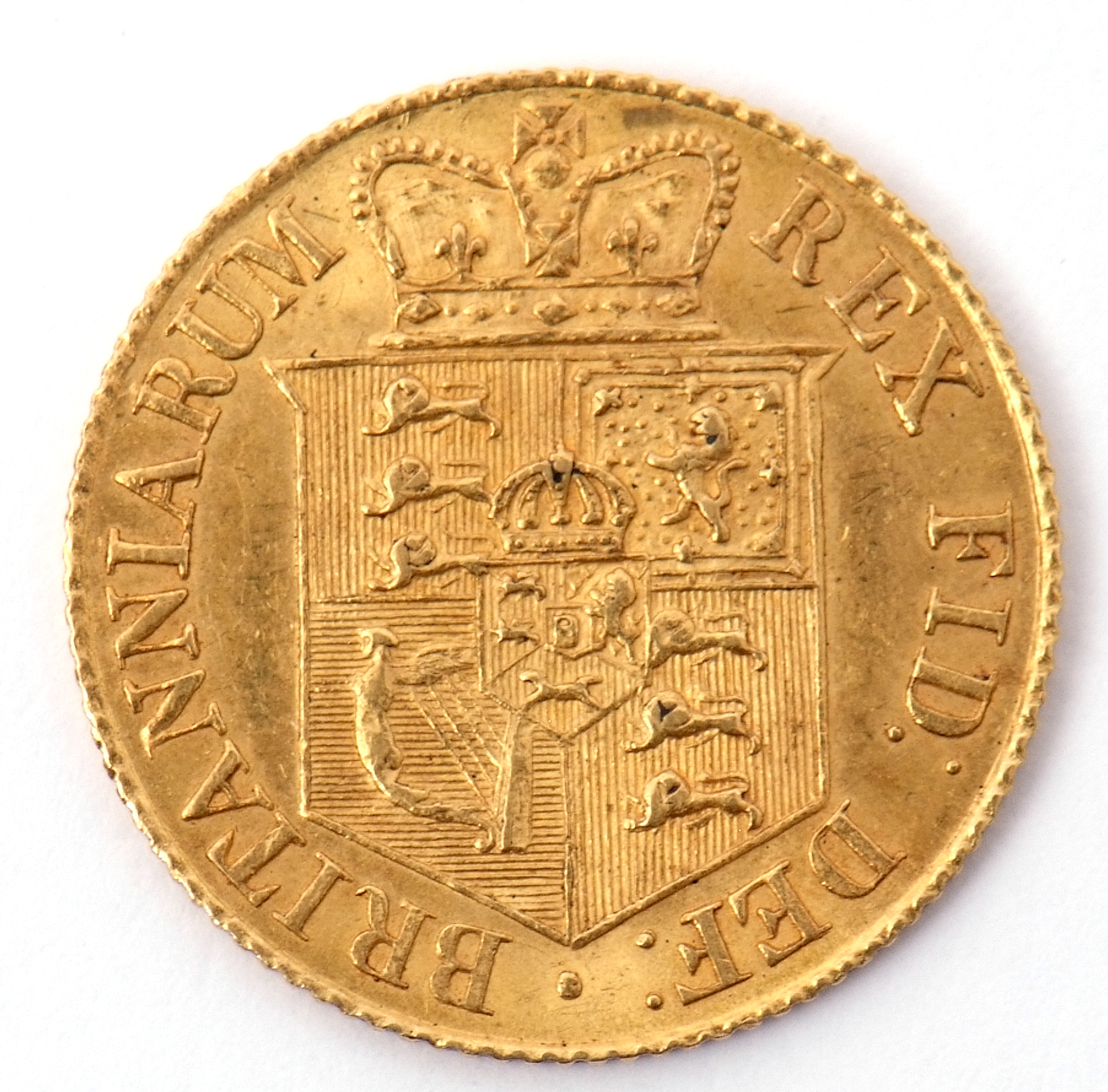 George III gold half sovereign dated 1817, Laureate head right, with date below, verso with a crown, - Image 2 of 3