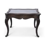 19th century Continental ebonised framed large bijouterie table of serpentined rectangular form,