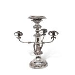 Large early Victorian silver plated centrepiece of candelabrum form, the circular base and