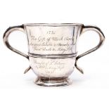 George I two-handled loving cup of usual form, having a raised body band, spreading circular foot