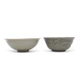 Two Longquan celadon bowls, possibly Ming dynasty, one with dragons chasing the flaming pearl, the