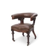 Early 19th century mahogany elbow or cockfighting type chair, heavy arm rests raised on scrolled