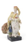 Early 19th century pearlware figure of Juno on square black base with a peacock by her side,